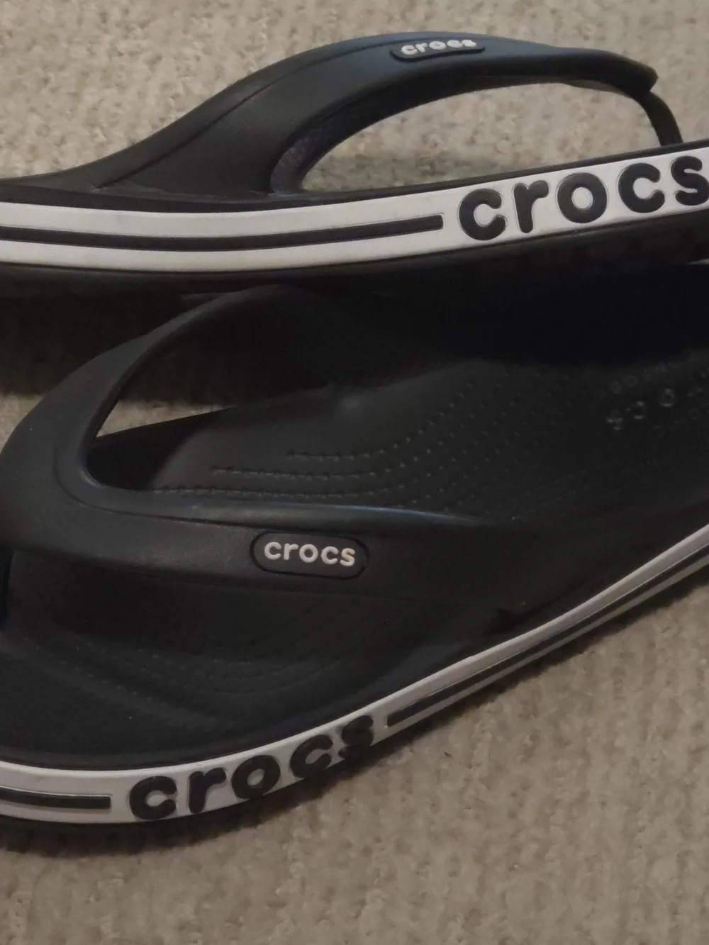CROCS Men’s Black & White Logo Flip Flops